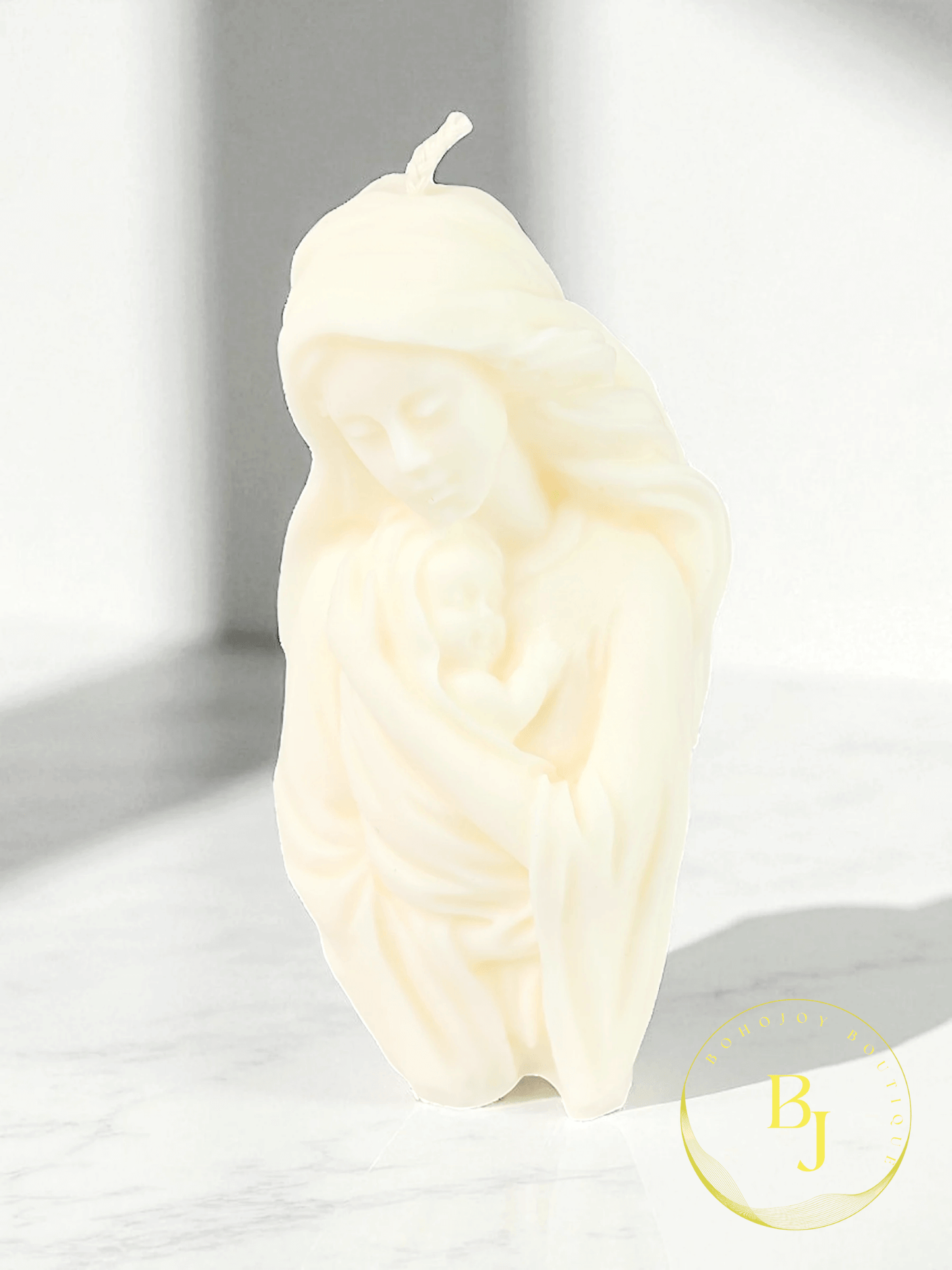 Bougie NID D'AMOUR en cire de soja écoresponsable représentant une femme et son enfant, faite main.