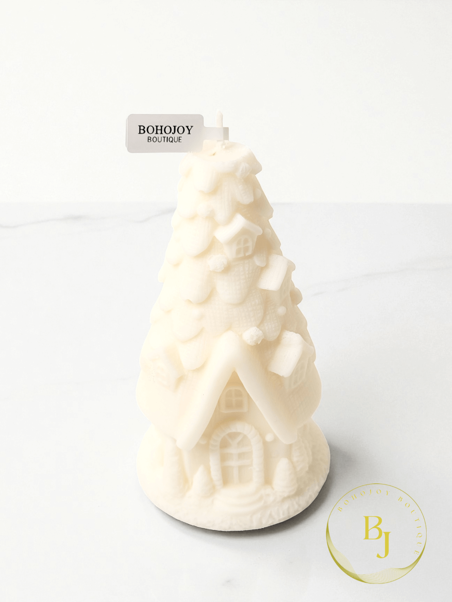 Bougie MAISON BLANCHE en forme de maisonnette enneigée, artisanale, design cocooning pour l'hiver.